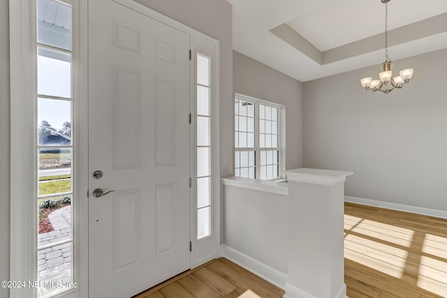85448 Sandy Ridge Loop Unit 0049, Yulee, FL 32097 - foyer entrance featuring plenty of natural light, light wood finished floors, and a chandelier