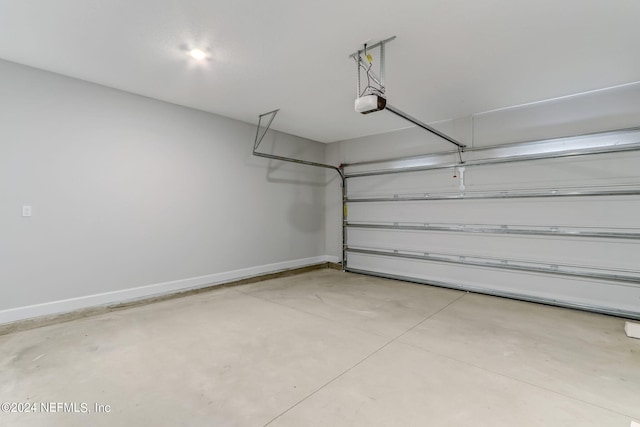 85448 Sandy Ridge Loop Unit 0049, Yulee, FL 32097 - garage featuring baseboards