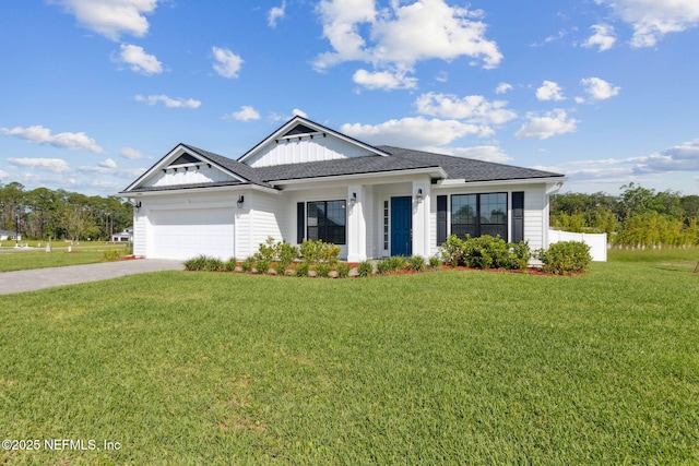 85448 Sandy Ridge Loop Unit 0049, Yulee, FL 32097 - modern farmhouse featuring a garage, a front yard, concrete driveway, board and batten siding, and roof with shingles
