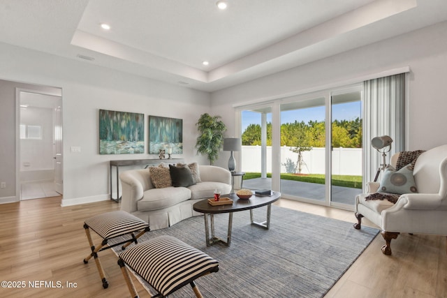 85448 Sandy Ridge Loop Unit 0049, Yulee, FL 32097 - living area featuring recessed lighting, a raised ceiling, and wood finished floors