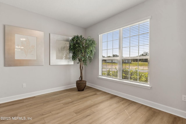 85448 Sandy Ridge Loop Unit 0049, Yulee, FL 32097 - unfurnished room with light wood finished floors and plenty of natural light