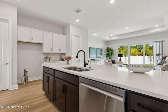 85448 Sandy Ridge Loop Unit 0049, Yulee, FL 32097 - kitchen featuring dishwasher, open floor plan, white cabinetry, light countertops, and recessed lighting