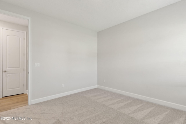 85448 Sandy Ridge Loop Unit 0049, Yulee, FL 32097 - unfurnished room featuring light carpet and baseboards