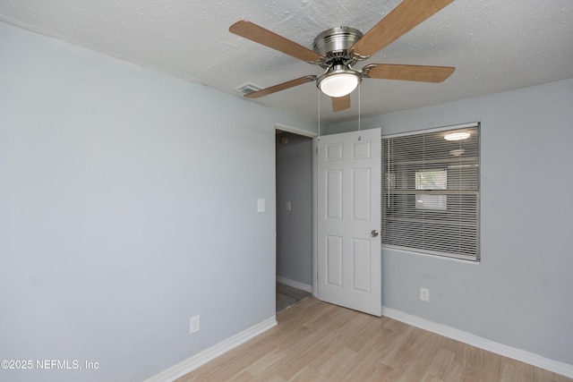 3303 Jones St, Jacksonville, FL 32206 - unfurnished room with a ceiling fan and wood finished floors