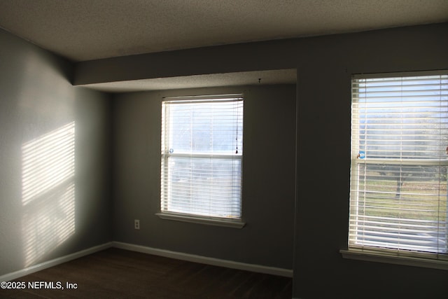 791 Assisi Ln Unit 302, Jacksonville, FL 32233 - carpeted empty room with a textured ceiling and baseboards