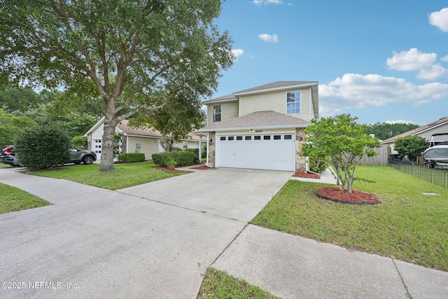 96016 Gray Heron Ct, Yulee, FL 32097 - traditional home with concrete driveway, stone siding, a garage, and roof with shingles
