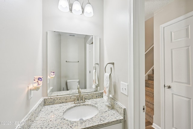 96016 Gray Heron Ct, Yulee, FL 32097 - bathroom with vanity and a textured ceiling