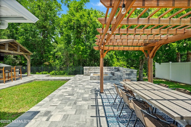 15067 Durbin Cove Way, Jacksonville, FL 32259 - view of patio with outdoor dining area, a pergola, and view of scattered trees