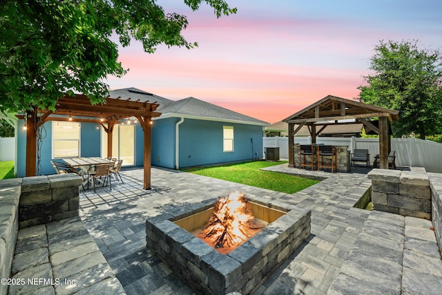 15067 Durbin Cove Way, Jacksonville, FL 32259 - fenced backyard featuring an outdoor fire pit, a gazebo, a patio area, and a pergola