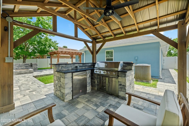 15067 Durbin Cove Way, Jacksonville, FL 32259 - view of patio with exterior kitchen, a gazebo, a ceiling fan, and a pergola