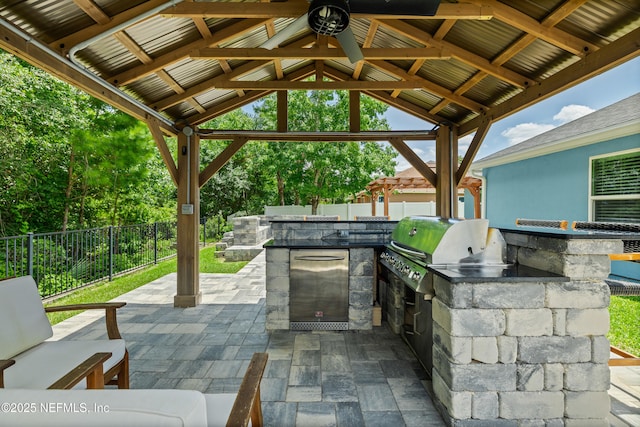 15067 Durbin Cove Way, Jacksonville, FL 32259 - view of patio with a gazebo, an outdoor kitchen, and a ceiling fan