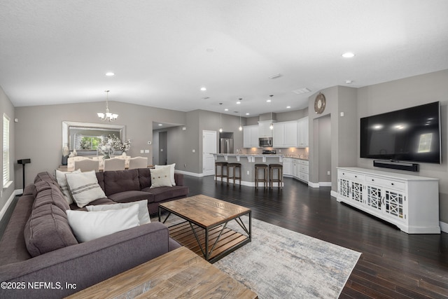 15067 Durbin Cove Way, Jacksonville, FL 32259 - living room featuring a chandelier, dark wood finished floors, recessed lighting, and lofted ceiling