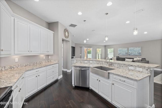 15067 Durbin Cove Way, Jacksonville, FL 32259 - kitchen with stainless steel appliances, open floor plan, recessed lighting, white cabinetry, and dark wood finished floors
