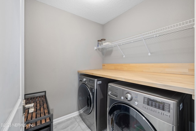 15067 Durbin Cove Way, Jacksonville, FL 32259 - laundry area featuring washing machine and dryer and light marble finish flooring