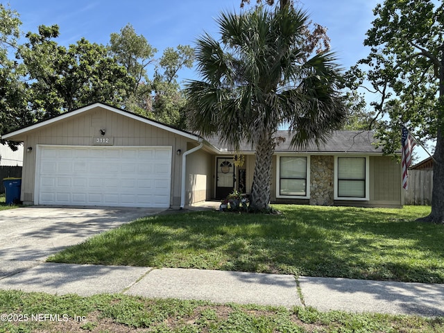 3112 Hampstead Dr, Jacksonville, FL 32225 - ranch-style house featuring an attached garage, driveway, and a front lawn
