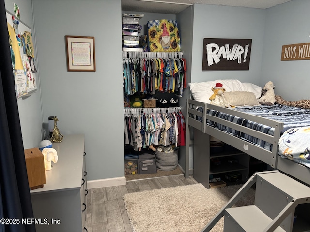 3112 Hampstead Dr, Jacksonville, FL 32225 - bedroom featuring a closet and wood finished floors