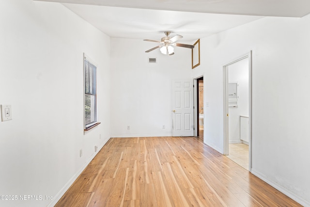 610 Division St, Fernandina Beach, FL 32034 - unfurnished room featuring light wood-type flooring, ceiling fan, and lofted ceiling