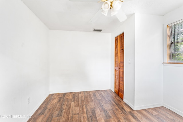 610 Division St, Fernandina Beach, FL 32034 - spare room featuring wood finished floors and a ceiling fan