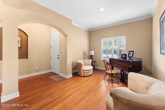 85339 Amagansett Dr, Fernandina Beach, FL 32034 - office featuring crown molding, arched walkways, light wood-type flooring, and recessed lighting