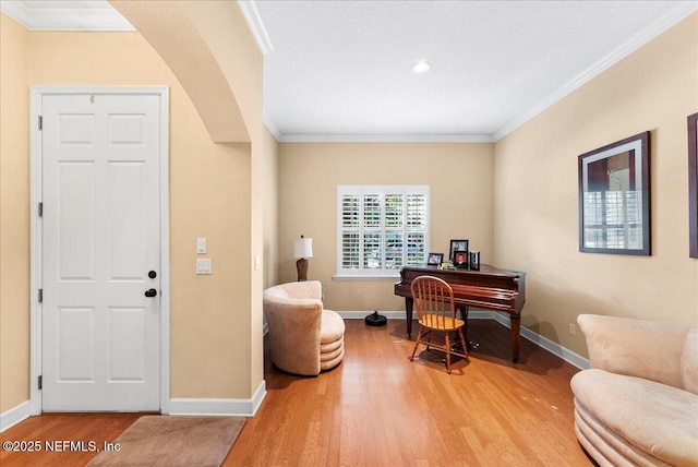 85339 Amagansett Dr, Fernandina Beach, FL 32034 - office space with crown molding, wood finished floors, arched walkways, and recessed lighting