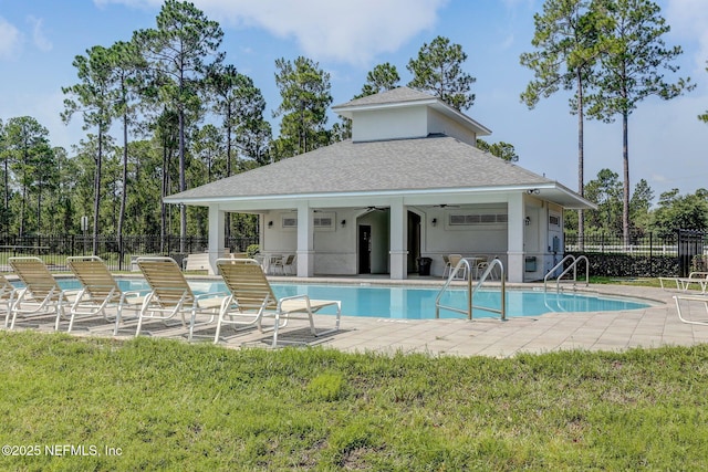 86051 Venetian Ave, Yulee, FL 32097 - community pool with a ceiling fan and a patio