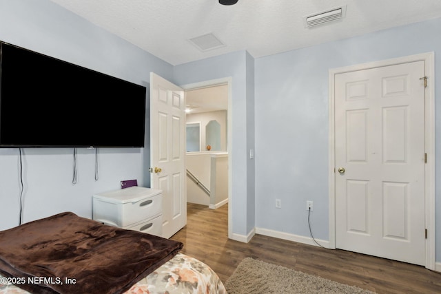 86051 Venetian Ave, Yulee, FL 32097 - bedroom with wood finished floors and baseboards