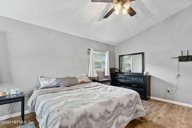 86051 Venetian Ave, Yulee, FL 32097 - bedroom with lofted ceiling, light wood finished floors, and ceiling fan
