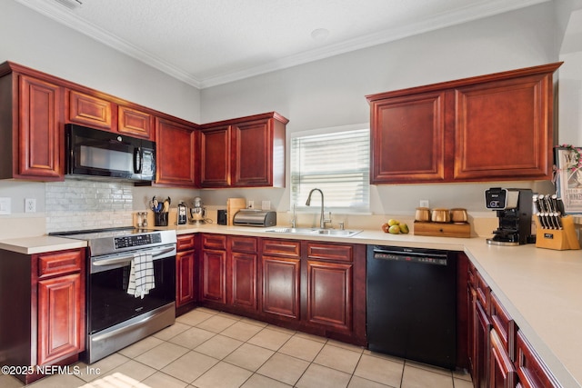 86051 Venetian Ave, Yulee, FL 32097 - kitchen with black appliances, dark brown cabinets, light countertops, crown molding, and light tile patterned floors