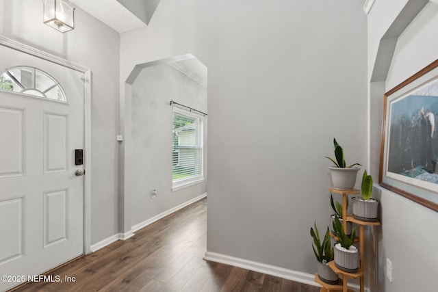86051 Venetian Ave, Yulee, FL 32097 - entrance foyer featuring dark wood finished floors and baseboards