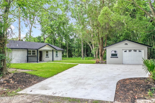 540485 US Highway 1, Callahan, FL 32011 - view of grassy yard featuring concrete driveway and an outbuilding