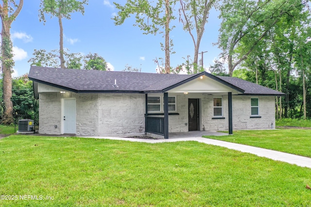540485 US Highway 1, Callahan, FL 32011 - single story home with stone siding, a front yard, and roof with shingles