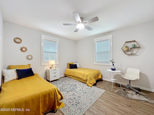 540485 US Highway 1, Callahan, FL 32011 - bedroom with wood finished floors and ceiling fan