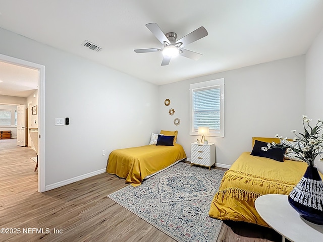 540485 US Highway 1, Callahan, FL 32011 - bedroom featuring wood finished floors and ceiling fan