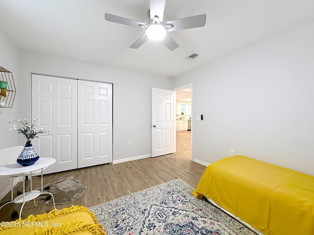 540485 US Highway 1, Callahan, FL 32011 - bedroom featuring wood finished floors, a closet, and ceiling fan