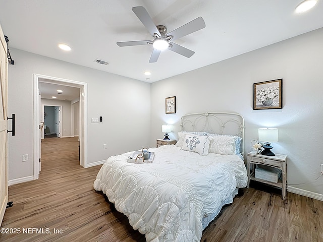 540485 US Highway 1, Callahan, FL 32011 - bedroom with wood finished floors, a ceiling fan, and recessed lighting