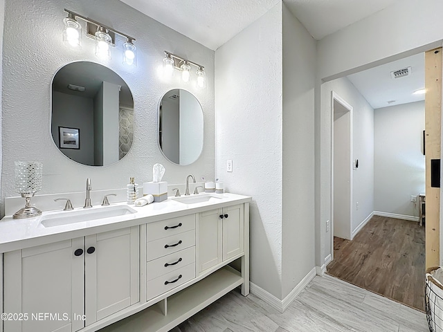 540485 US Highway 1, Callahan, FL 32011 - full bath with double vanity and wood finished floors