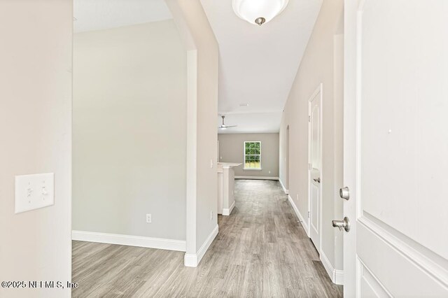 451632 Old Dixie Hwy, Callahan, FL 32011 - corridor with light wood-style floors and arched walkways