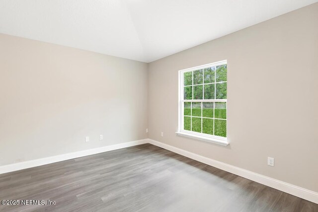 451632 Old Dixie Hwy, Callahan, FL 32011 - empty room with baseboards and dark wood-style floors