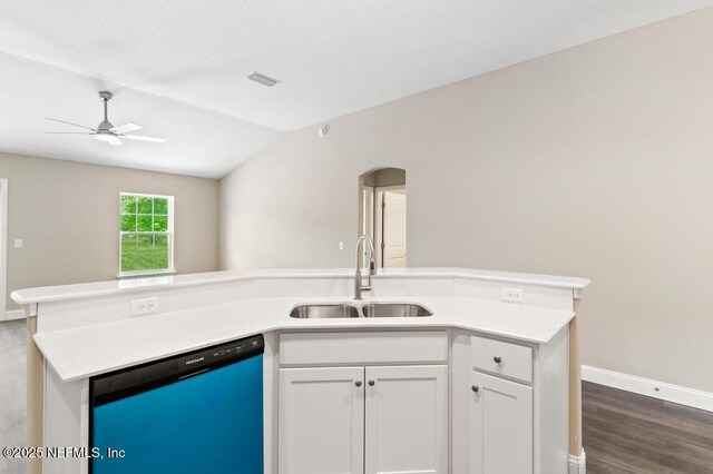 451632 Old Dixie Hwy, Callahan, FL 32011 - kitchen featuring dishwasher, lofted ceiling, a ceiling fan, light countertops, and white cabinetry
