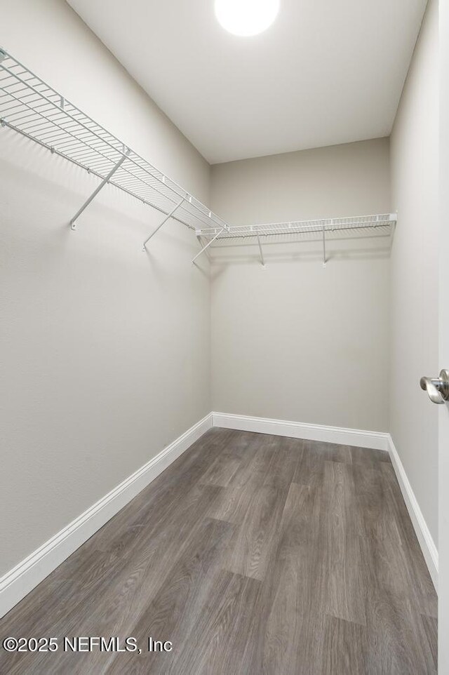 451632 Old Dixie Hwy, Callahan, FL 32011 - spacious closet featuring dark wood-style floors