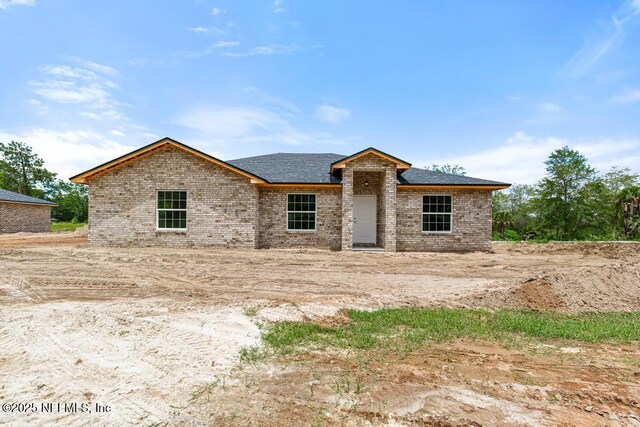 451632 Old Dixie Hwy, Callahan, FL 32011 - view of front of property with brick siding and roof with shingles