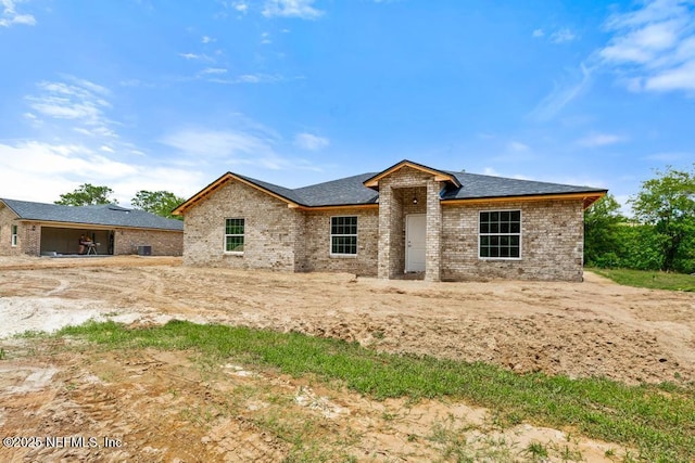 451632 Old Dixie Hwy, Callahan, FL 32011 - view of front of property with brick siding and roof with shingles