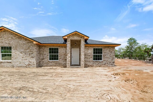 451632 Old Dixie Hwy, Callahan, FL 32011 - view of front of home with roof with shingles and brick siding