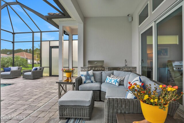 2459 Karatas Ct, Jacksonville, FL 32246 - view of patio / terrace featuring an outdoor hangout area, exterior kitchen, and glass enclosure