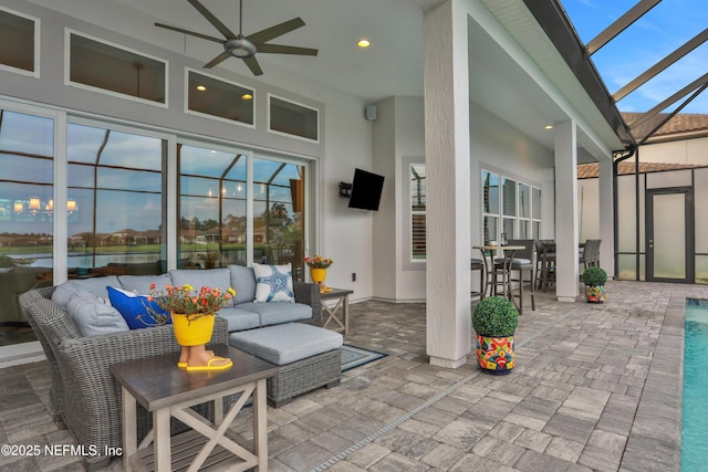 2459 Karatas Ct, Jacksonville, FL 32246 - view of patio / terrace featuring a ceiling fan, an outdoor hangout area, a lanai, and outdoor dining space