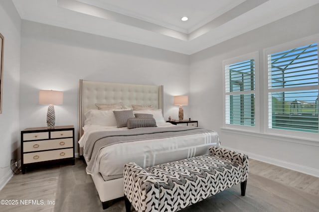 2459 Karatas Ct, Jacksonville, FL 32246 - bedroom with a raised ceiling, wood finished floors, ornamental molding, and recessed lighting