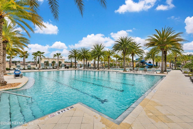 2459 Karatas Ct, Jacksonville, FL 32246 - community pool featuring a patio