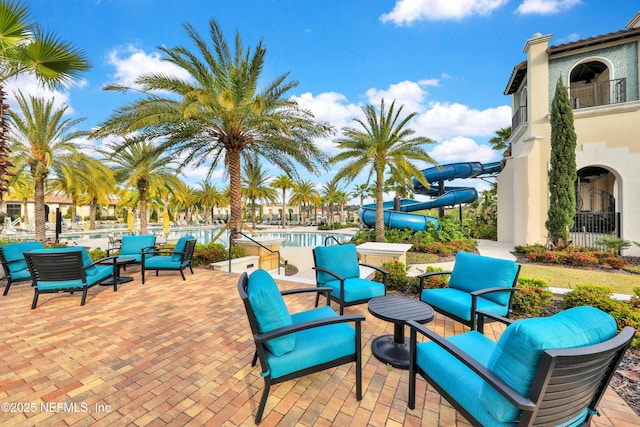 2459 Karatas Ct, Jacksonville, FL 32246 - view of patio featuring a swimming pool and outdoor lounge area