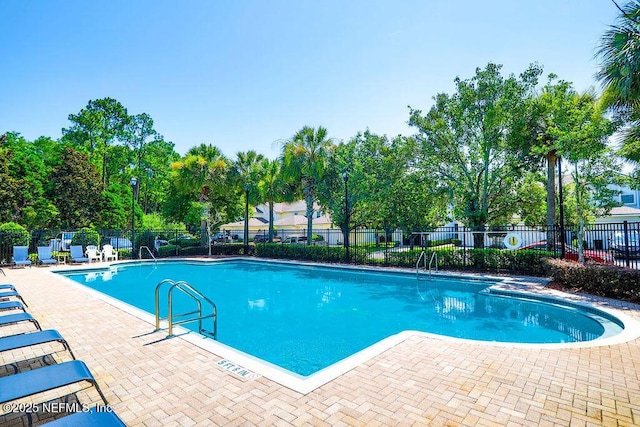 307 Southern Branch Ln, Saint Johns, FL 32259 - community pool with a patio