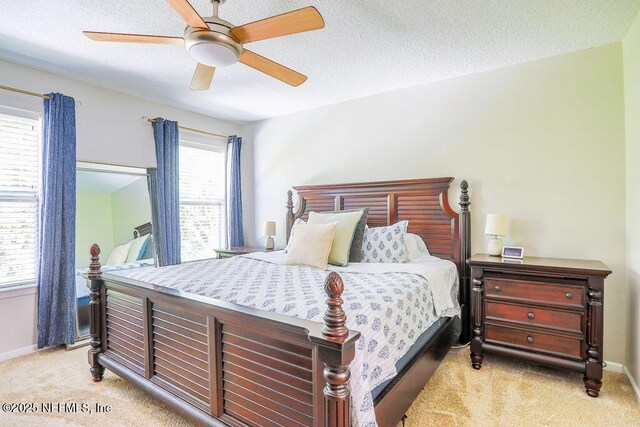 307 Southern Branch Ln, Saint Johns, FL 32259 - bedroom featuring light carpet, ceiling fan, and a textured ceiling